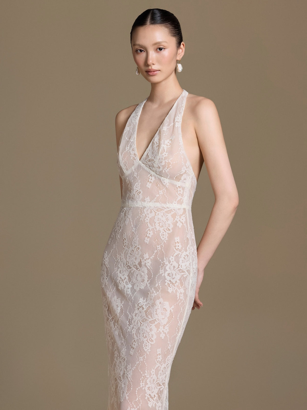 Paradis Lace Dress in white, three-quarter front view